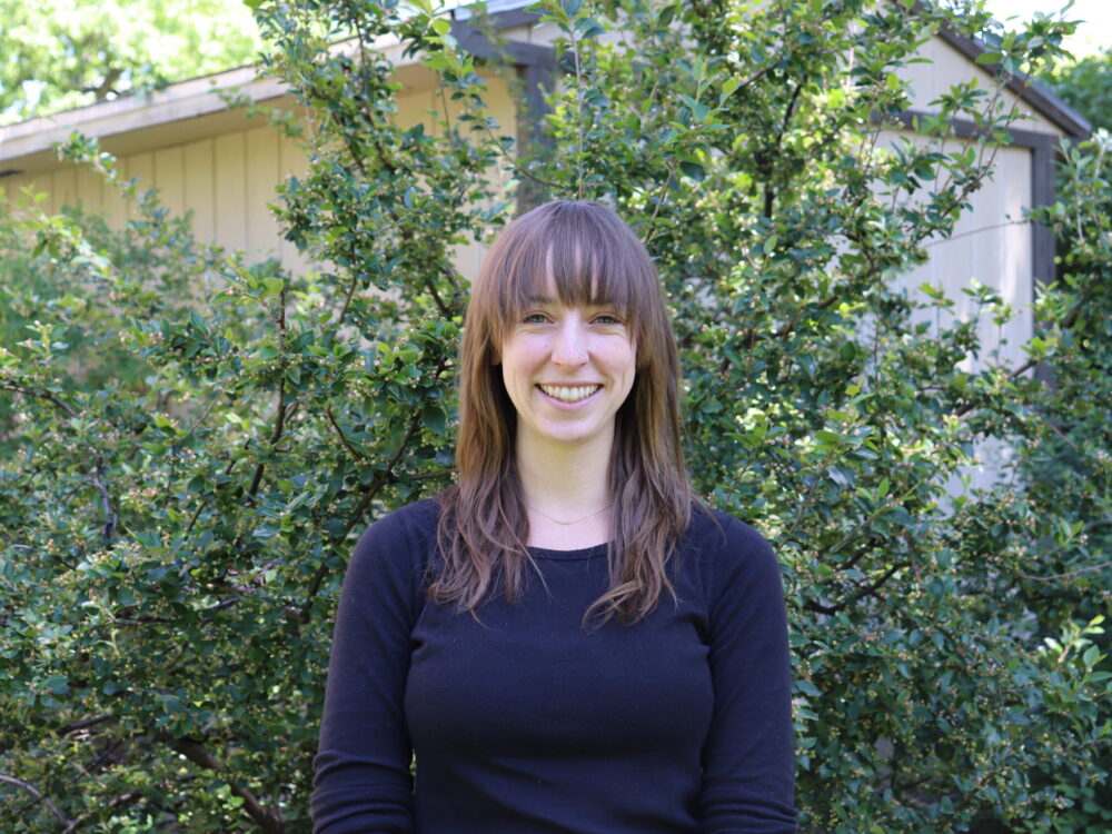 An outdoor portrait of Erin Pless